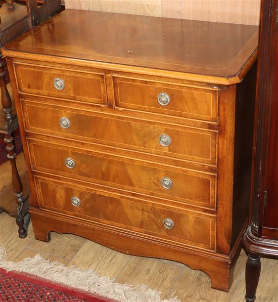 A pair of reproduction walnut five drawer chests W.78cm